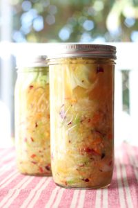 Orange Apple Cranberry Sauerkraut recipe. Easy recipe using seasonal fall fruit and cabbage. This would go perfect with pulled pork, chicken or a salad.