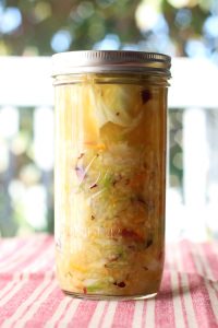 Orange Apple Cranberry Sauerkraut recipe. Easy recipe using seasonal fall fruit and cabbage. This would go perfect with pulled pork, chicken or a salad.