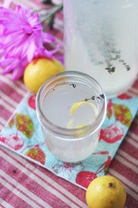 Recipe for lemon thyme green tea kombucha. It's refreshingly tart, lemony and tastes like summer picnics!