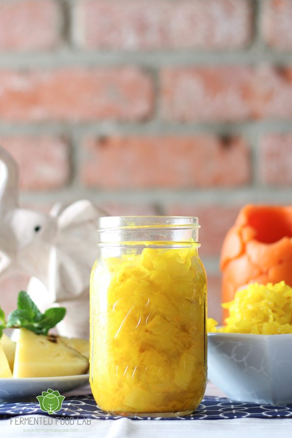 Pineapple Turmeric Sauerkraut and Gut Shots recipes. A crowd pleasing combination that is tangy, sweet and refreshing, anti-inflammatory and probiotic.