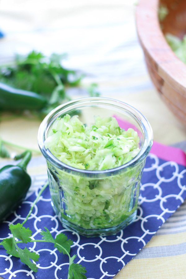 Jalapeño Cilantro Sauerkraut recipe is bursting with flavor. It's rich in probiotics, amazing for digestion and tastes like green salsa.