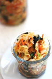 Recipe for Kale Kimchi. It's garlicky, spicy, savory and bursting with unami flavor and made with easy to find ingredients.