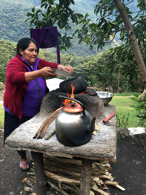 Trip To Peru. Fresh coffee beans being roasted over an open fire.