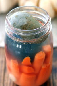 Can't get your sauerkraut or pickles to stay under the brine? Here are way tips to keep veggies under the brine. Simple and easy.