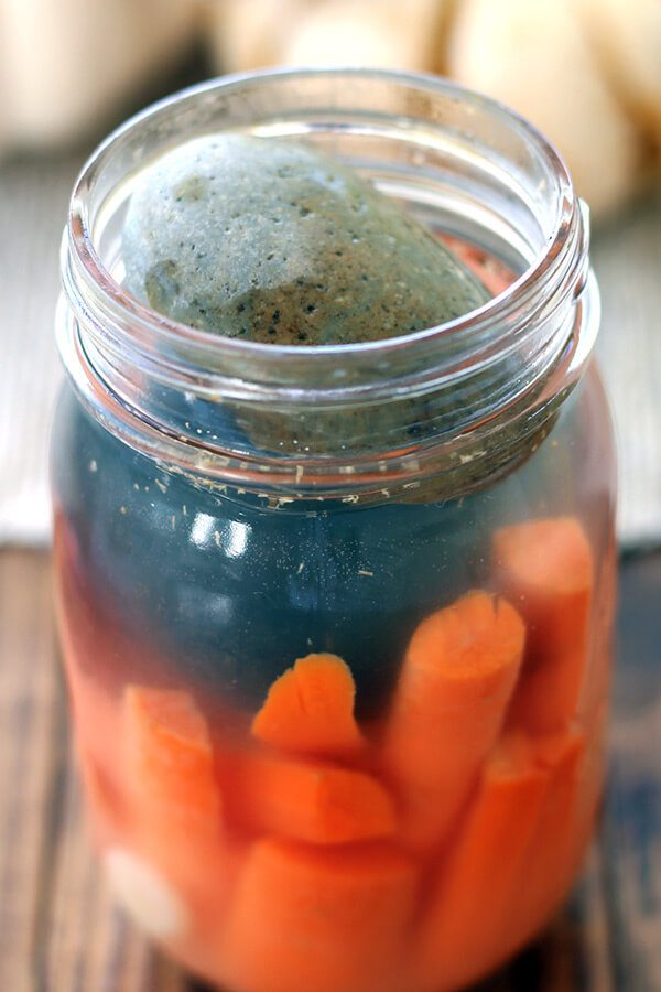 Can't get your sauerkraut or pickles to stay under the brine? Here are ways to keep veggies under the brine. Simple and easy.
