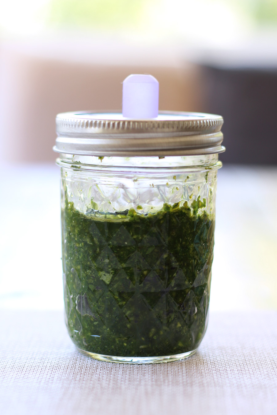 Bursting with sweet, herby, garlic flavor, this Fermented Basil and garlic paste recipe is the perfect base for dressings and sauces. 